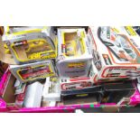 A box of mainly Burago model cars.