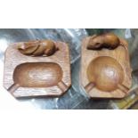 Two English oak carved ashtrays, one by Robert "Mouseman" Thompson and the other Peter "Rabbitman"