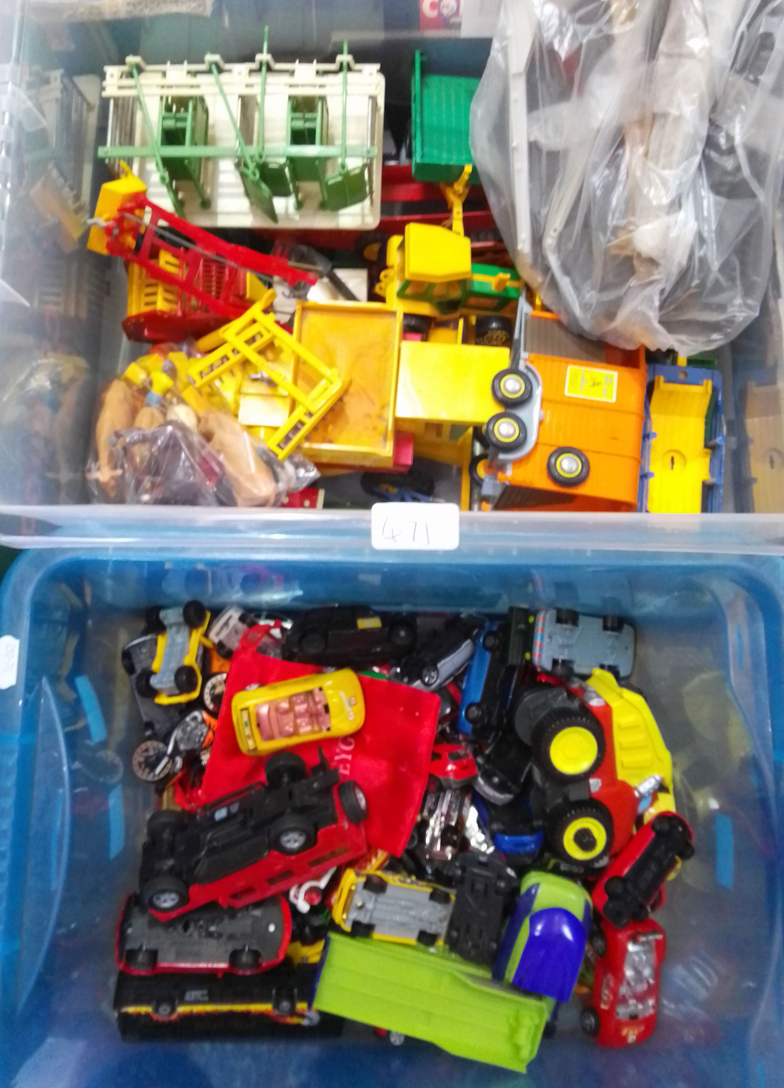 Two boxes of toys including Britain's farm vehicles, die cast model vehicles, etc.