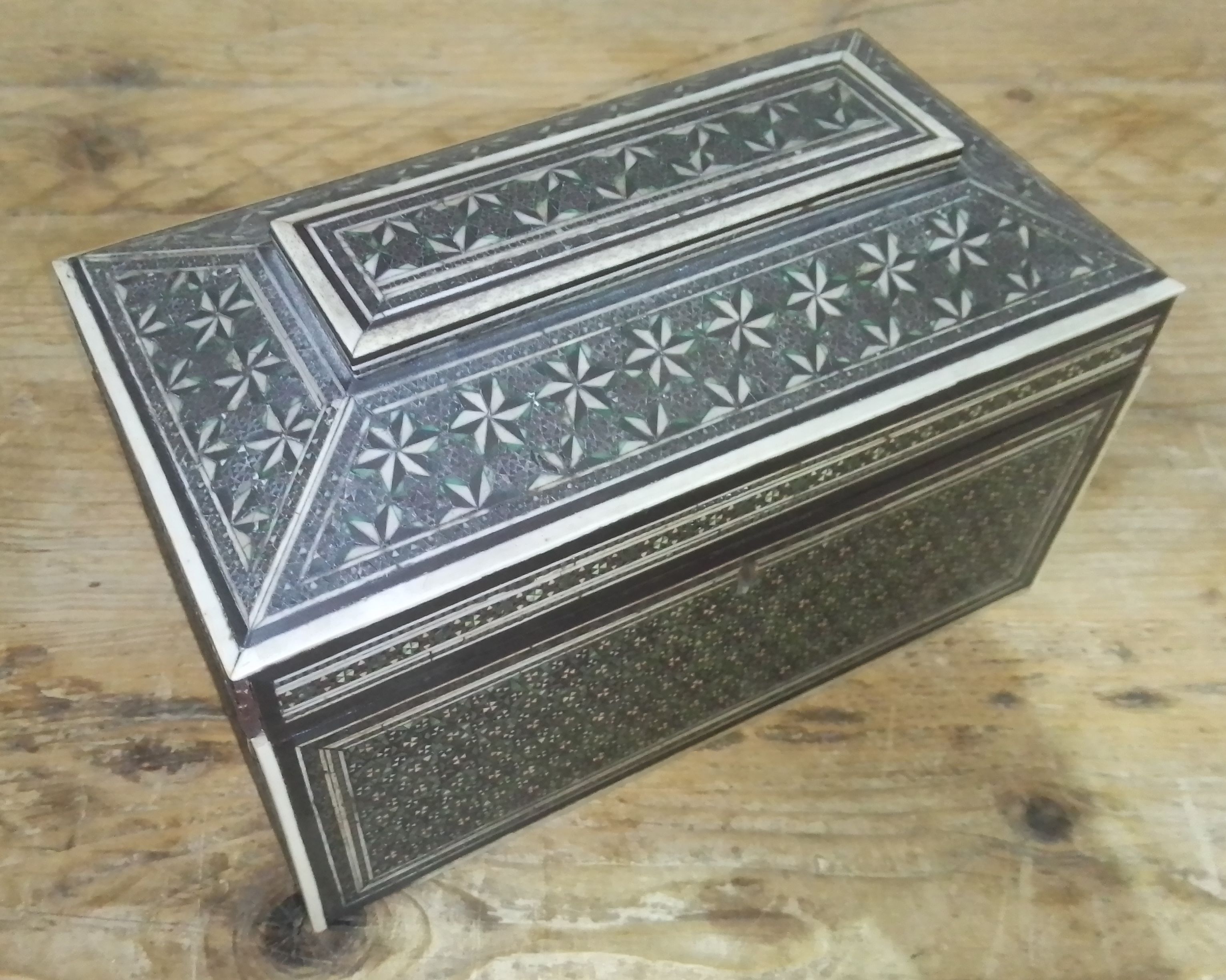 An Indian 19th century Vizagapatam bone inlaid tea caddy, length 23cm.