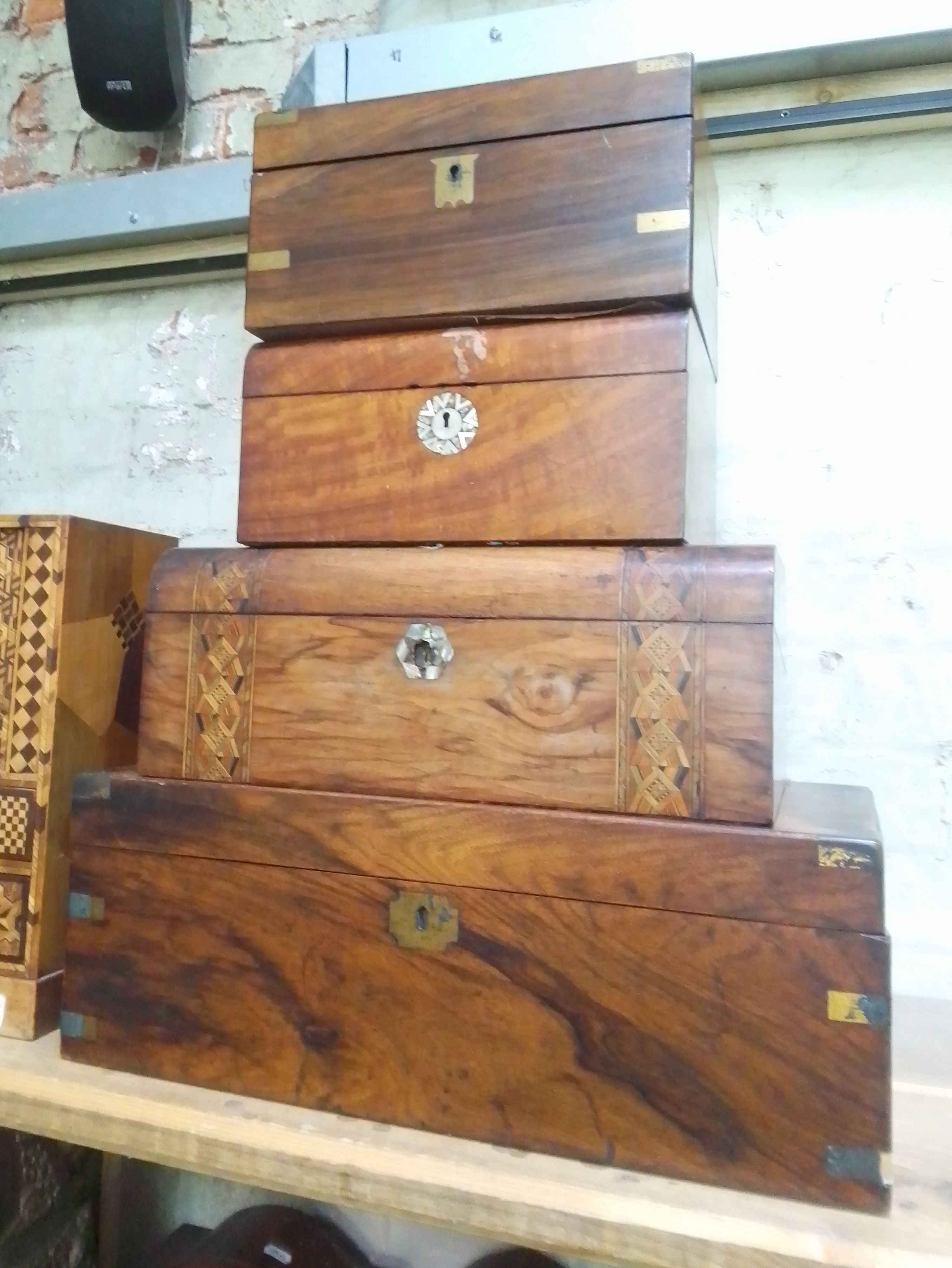 Three 19th century writing slopes and work box.