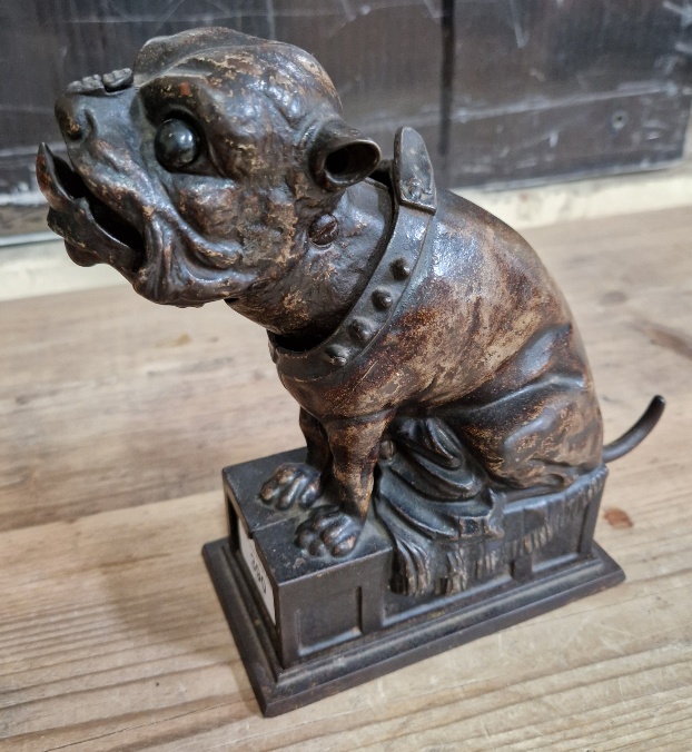 A 19th century cast iron 'BULL DOG BANK' mechanical money bank, impressed with 'PATD APR 27 1880' to