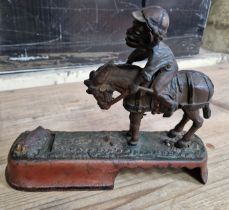 A 19th century cast iron mechanical money bank, 'I always did 'spise a mule', impressed with 'ENG