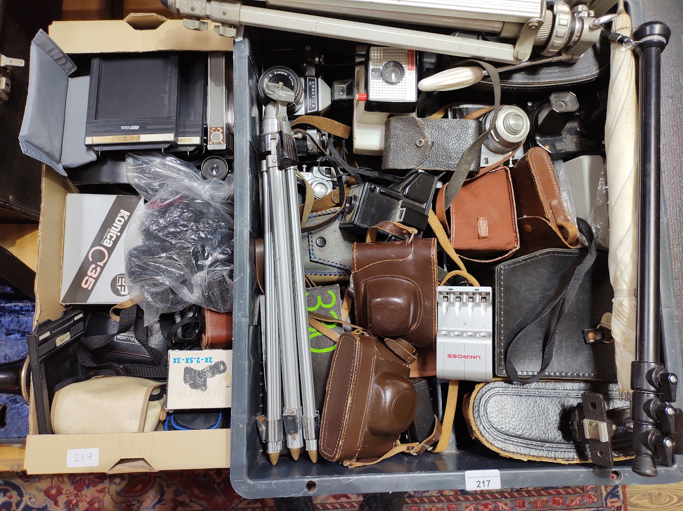 Two boxes of cameras, binoculars and accessories including vintage cameras, tripods, compacts,