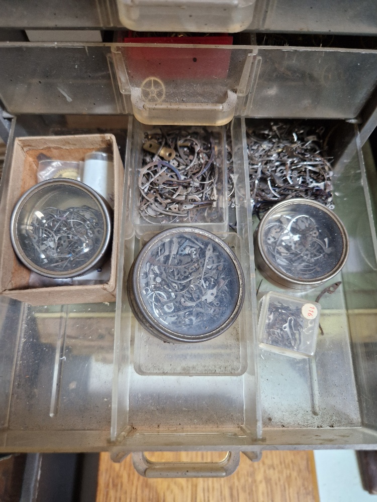 Wooden, plastic and metal cabinets of watch spares. - Image 10 of 18