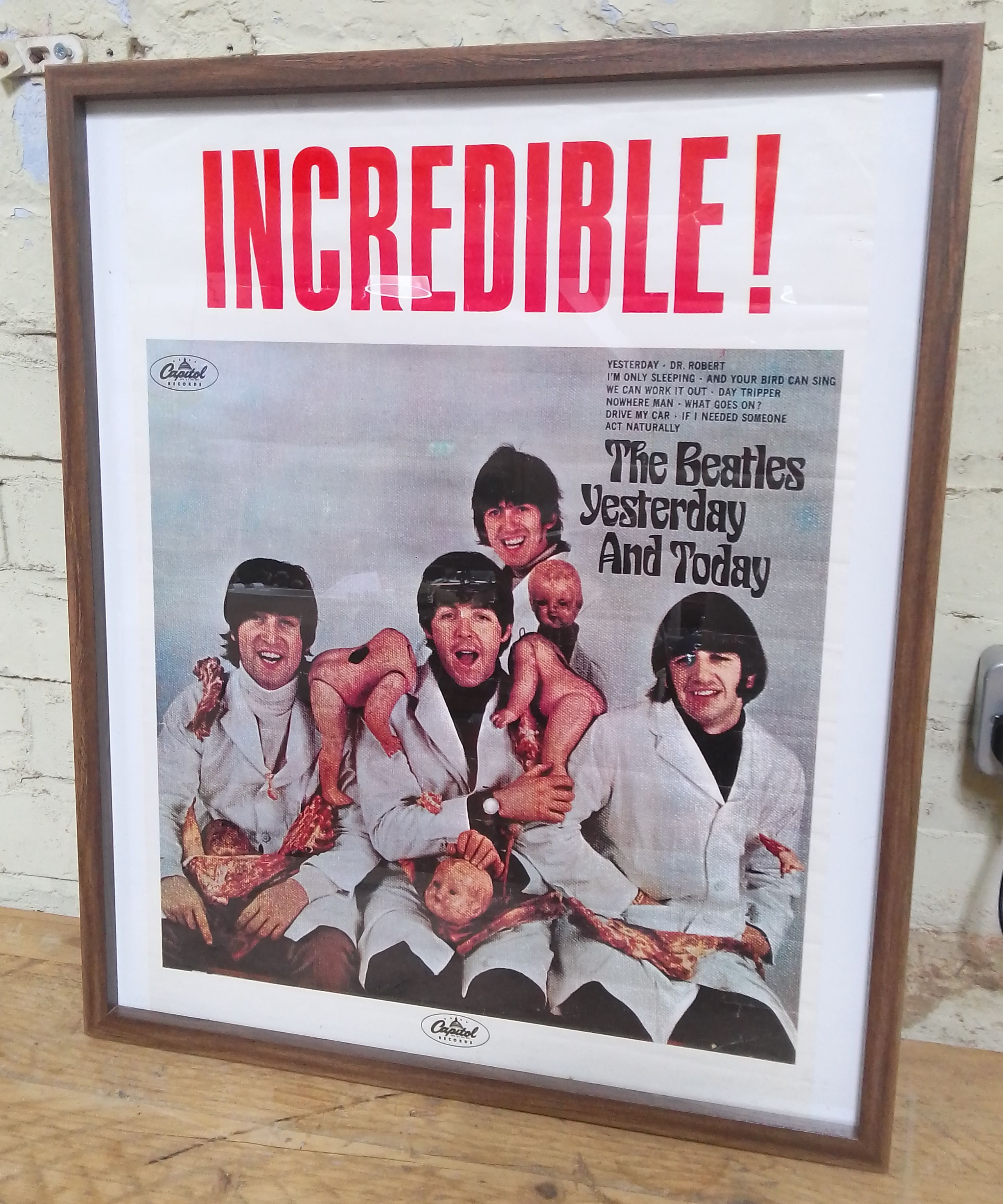 A Beatles Incredible 'Yesterday and Today' butcher album poster, 42.5cm x 57cm, framed, 51cm x 61cm.