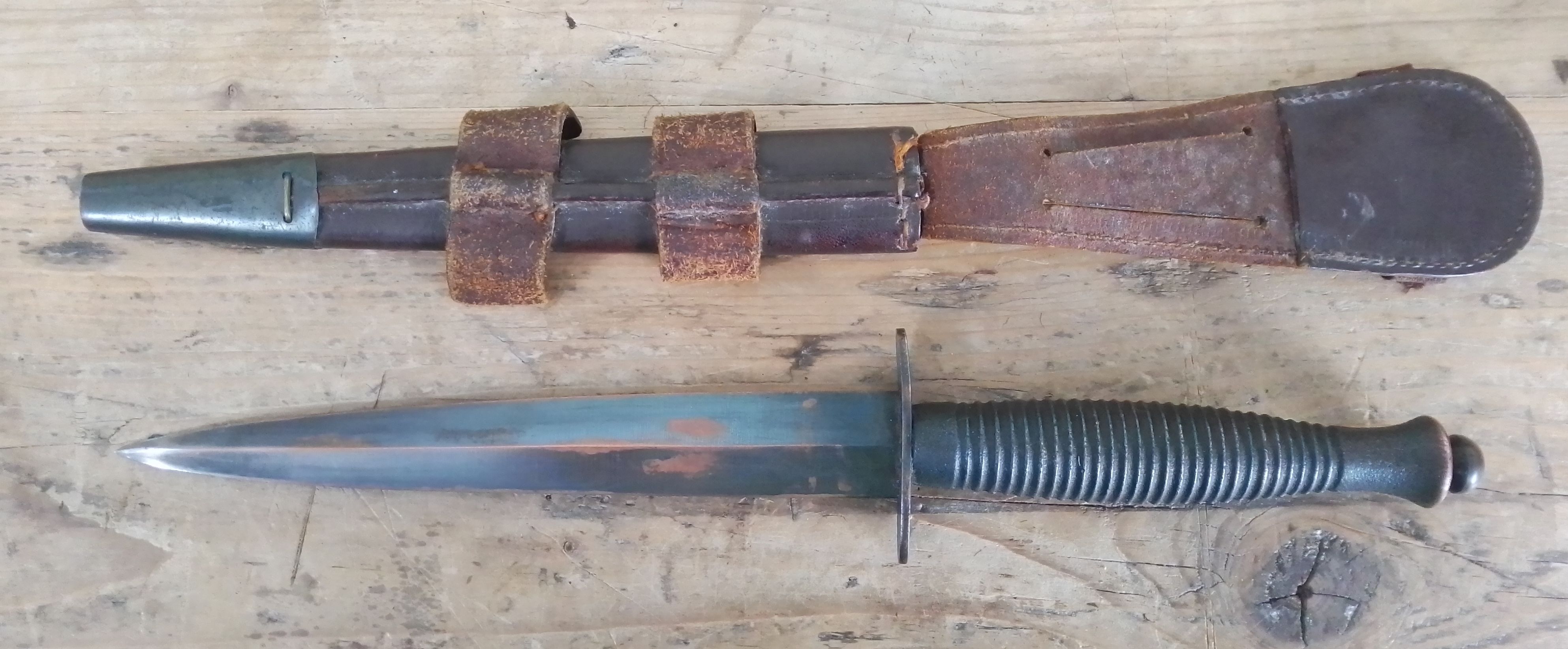 A post war Fairbairn Sykes British commando dagger and sheath. - Image 2 of 2