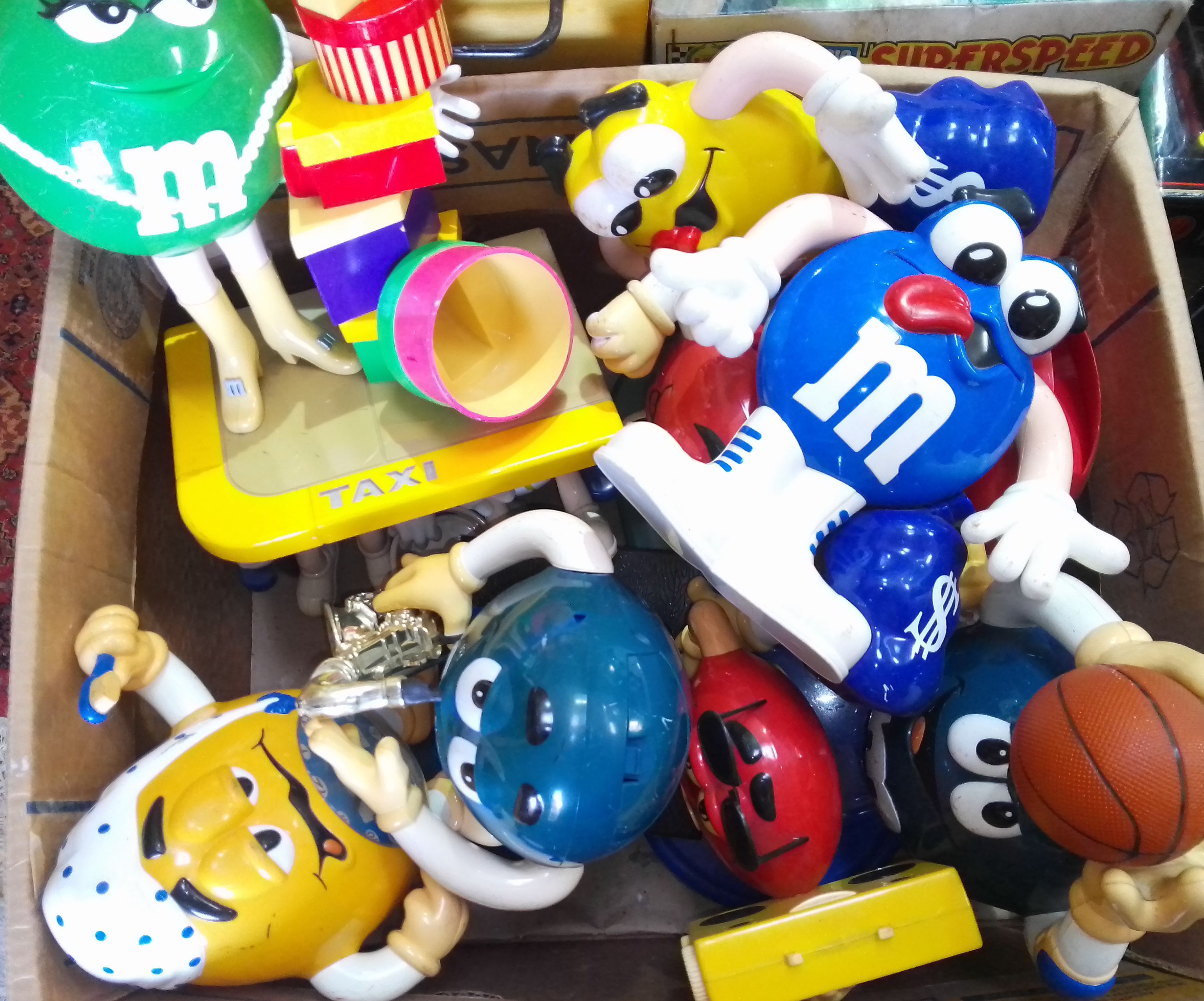 A collection of Mars M&Ms plastic figures.