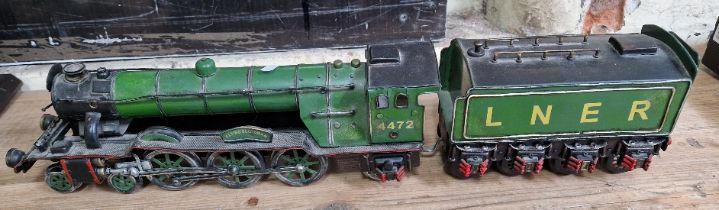 A tin plate train and tender, 'FLYING SCOTSMAN 4472', 55cm total length.