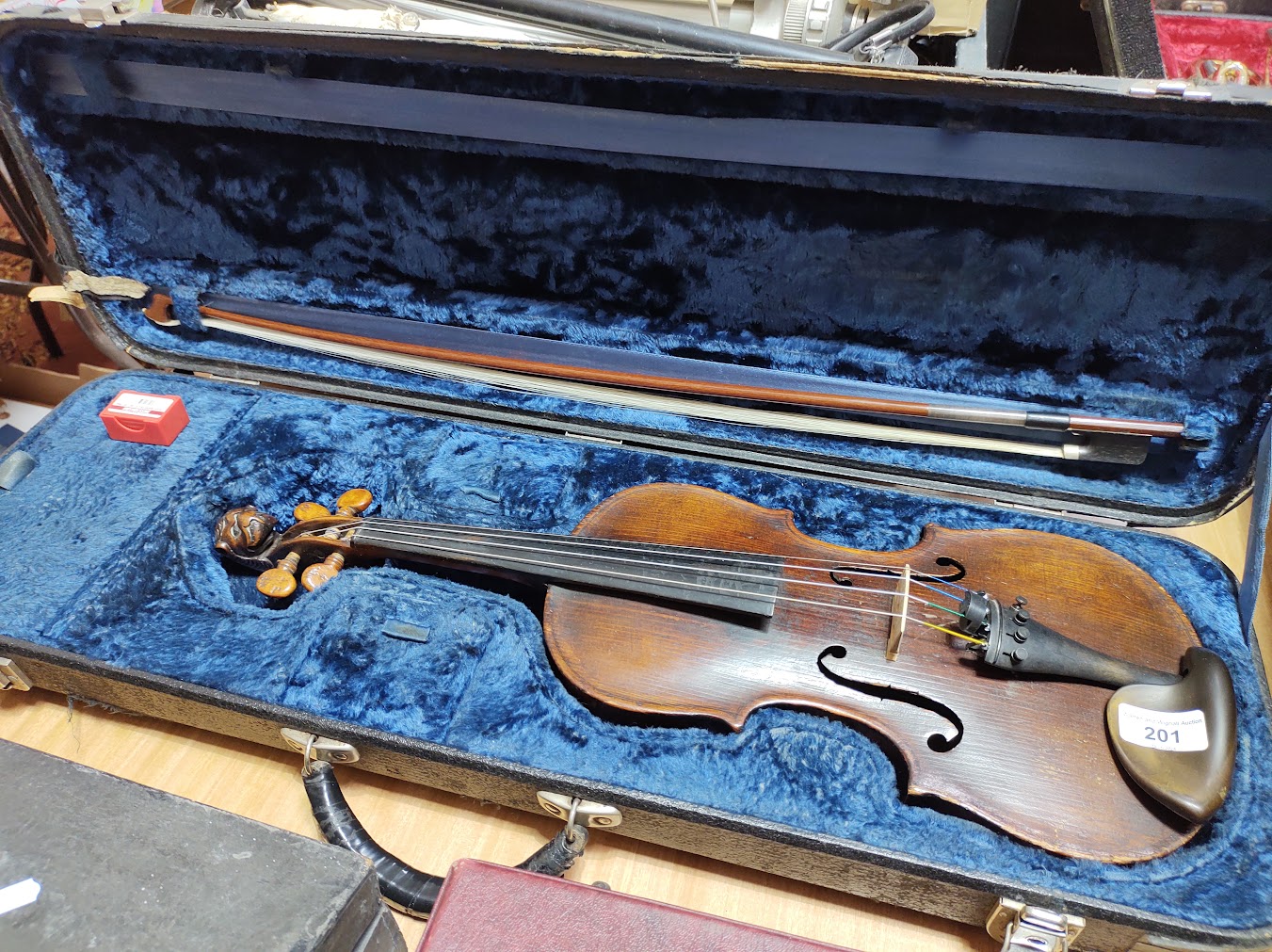 A German 19th century violin, one piece back, length 355mm, with bow stamped Homa, in hard case.