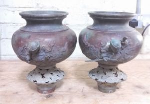 A pair of Chinese bronze vases or incense burners, bayonet fittings, possibly off a chariot or