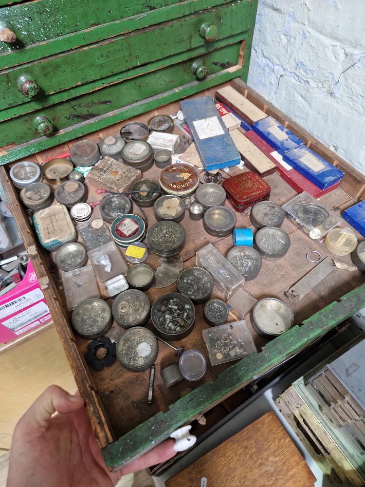 A large green horologist's chest and contents comprising watch and clock making spares. - Image 9 of 12