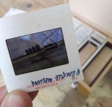A case of colour slides comprising 110 depicting scenes from the British Grand Prix Aintree 1961,