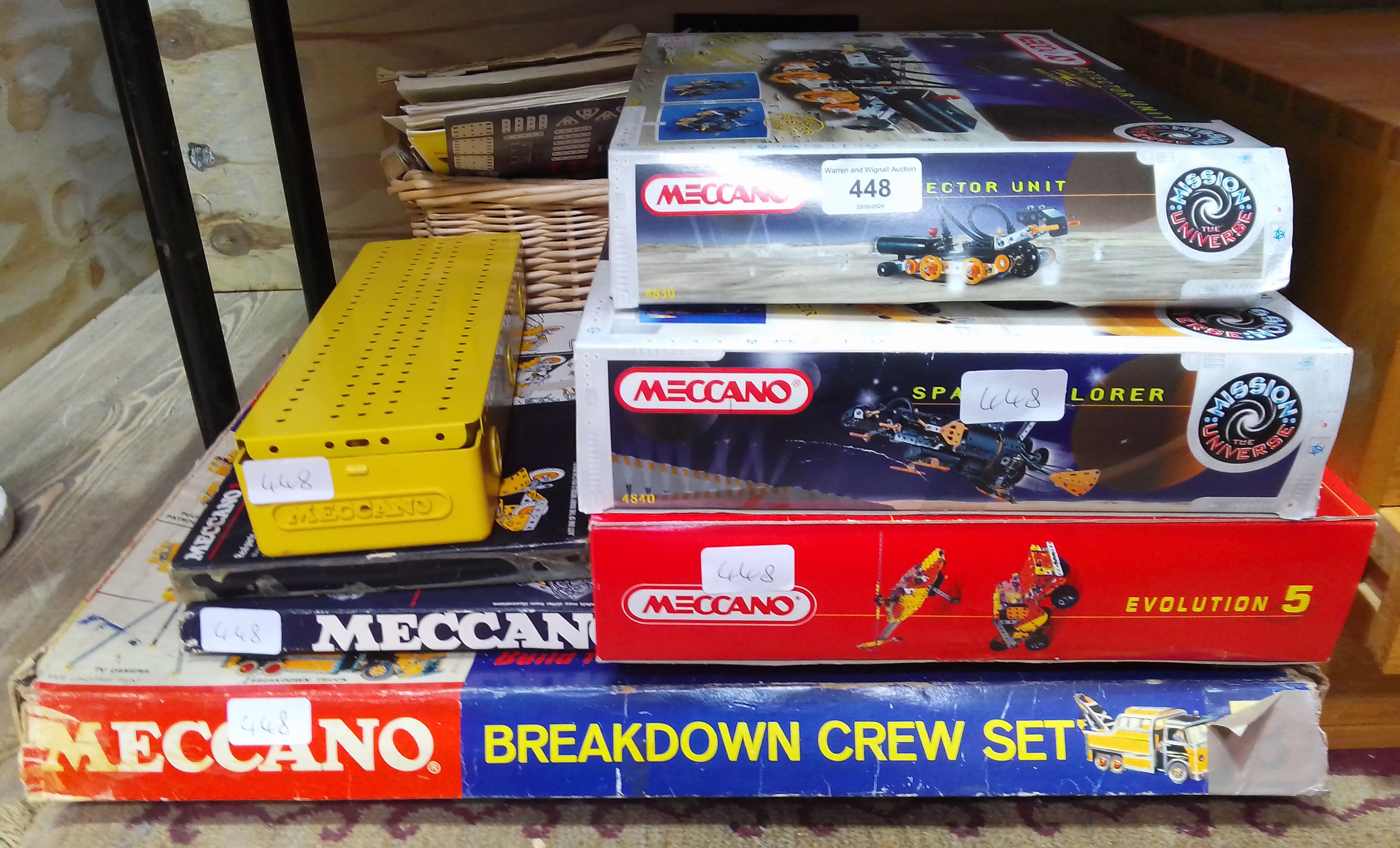 A quantity of assorted Meccano sets and magazines.