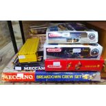 A quantity of assorted Meccano sets and magazines.