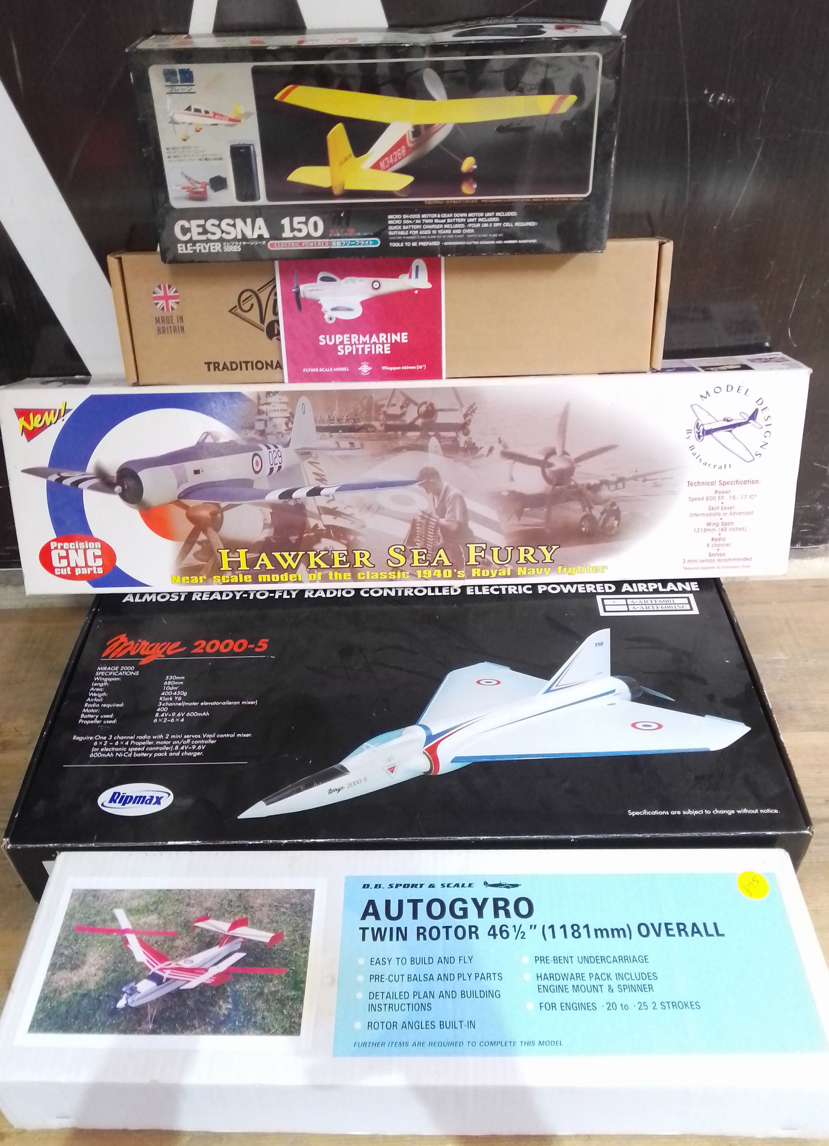 A group of five unbuilt aircraft kits comprising a Mirage 2000-5, a Balsacraft Hawker Sea Fury, a