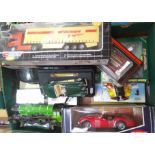 A box of assorted toys vehicles.