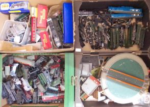 Four boxes of mainly Hornby 00 gauge model railway including engine parts, accessories.