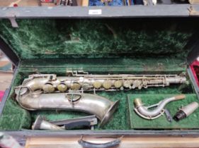 An American tenor saxophone marked 'Martin, Elkhart Ind', 'LOW PITCH', serial no.108530, with...