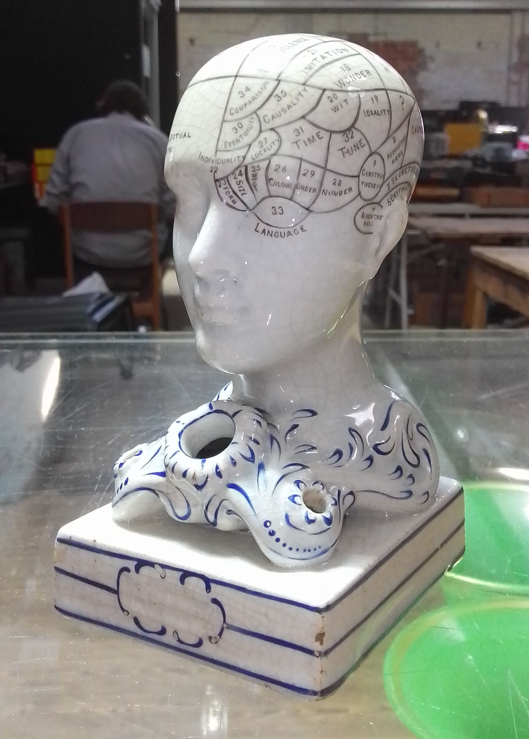 A Bridges mid 19th century pottery phrenology head inkwell, height 14cm.