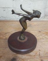 A bronze car mascot modelled as a nude lady, mounted on wooden base, height 19.5cm.