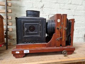 A mahogany Thornton-Pickard 'Ruby' enlarger/magic lantern, circa 1900.