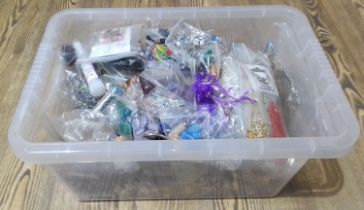 A box of assorted costume jewellery.