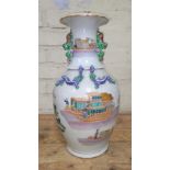 A Chinese porcelain vase, mid 19th century, decorated in over enamels with boats and figures,