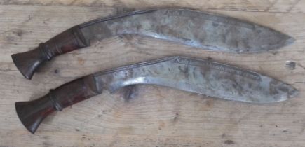 A pair of kukri knives, length 42.5cm.