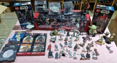A collection of assorted Star War items to include a mega figurine set, coasters, keyring, Lego...