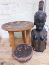 Three African items comprising a large figure H:60cm, a stool H:38cm and a drum.
