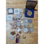 A tub of assorted GB coins, medals & a silver ring to include commemorative crowns (1 gold