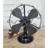 A vintage Universal electric fan.