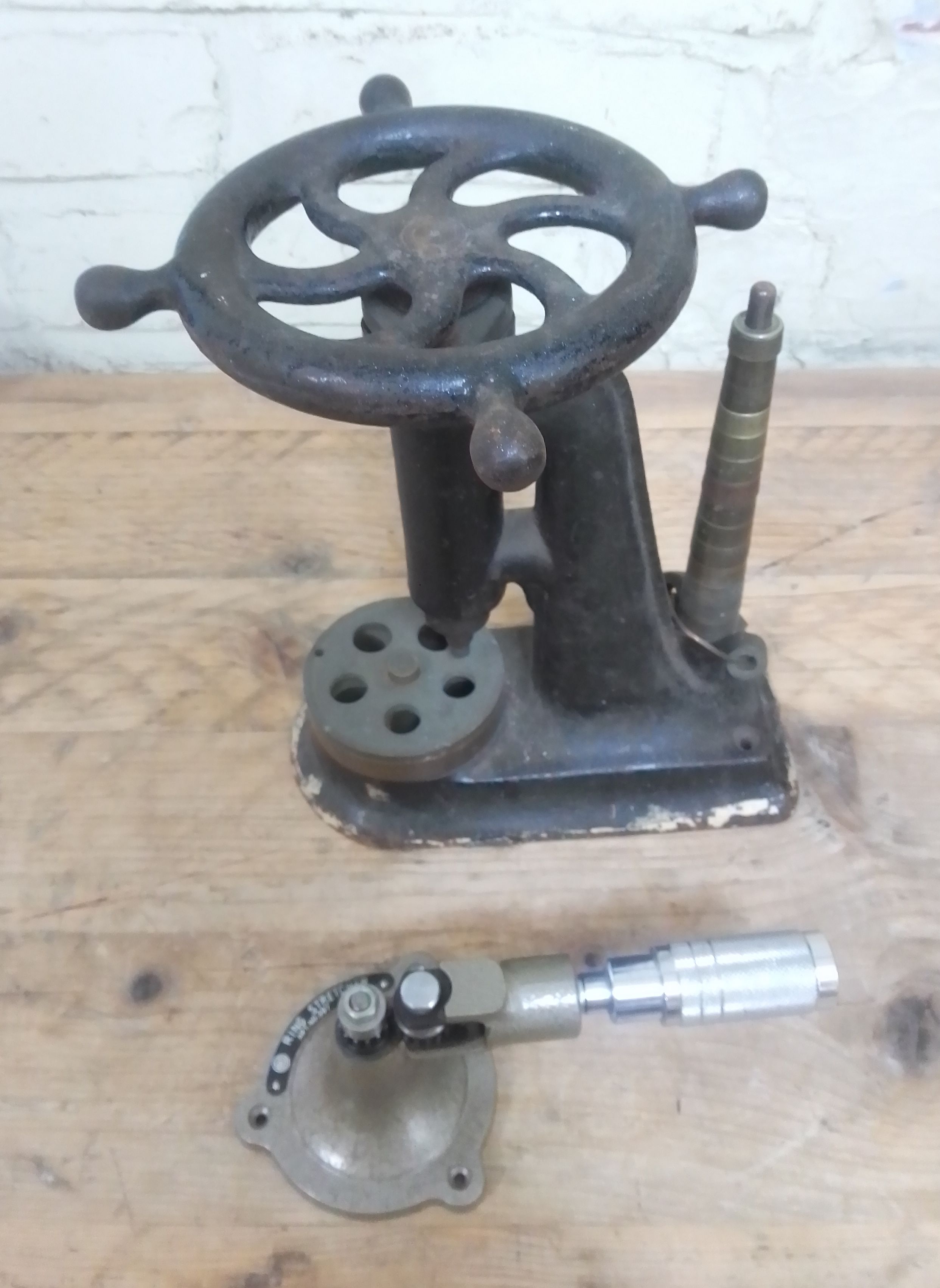 A jeweller's cast iron ring stretcher and another.