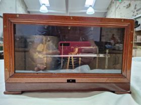 A wooden cased barograph by Barometre Holosterique.