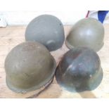 A WWII Bulgarian helmet and three others.