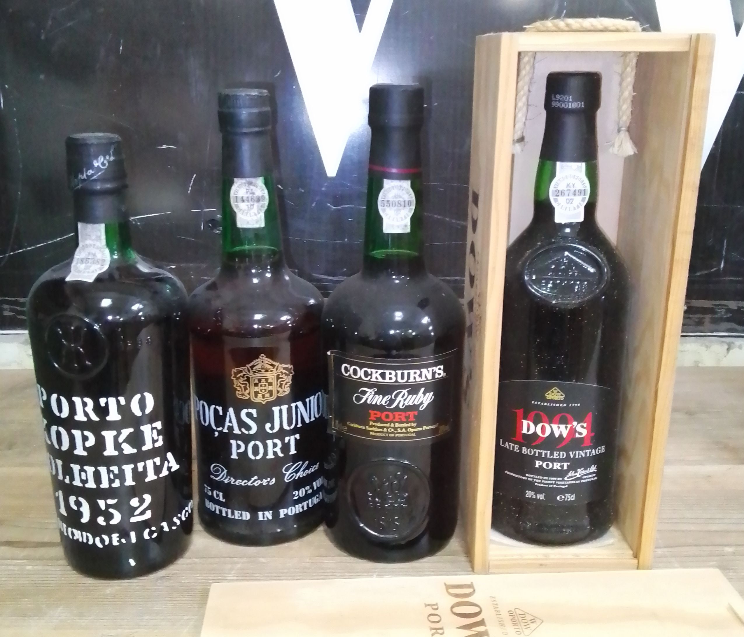 Four bottles of port including a Kopke Colheita 1952