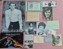 A collection of assorted autographs, including John Lennon, Ray Charles, Steven spielberg etc