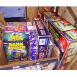 Assorted toys and games including Monopoly 1998 World Cup, Bank Attack, MB Games, Captain Scarlet