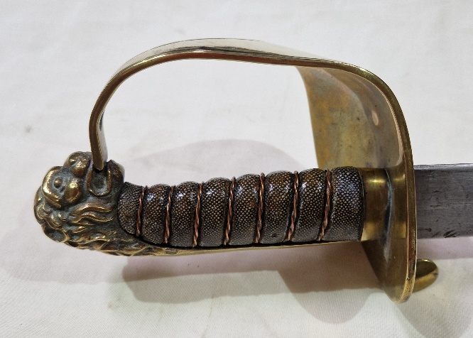 A Naval type sabre with wired shagreen handle, brass guard and cast lion pommel, blade length 74. - Image 6 of 20