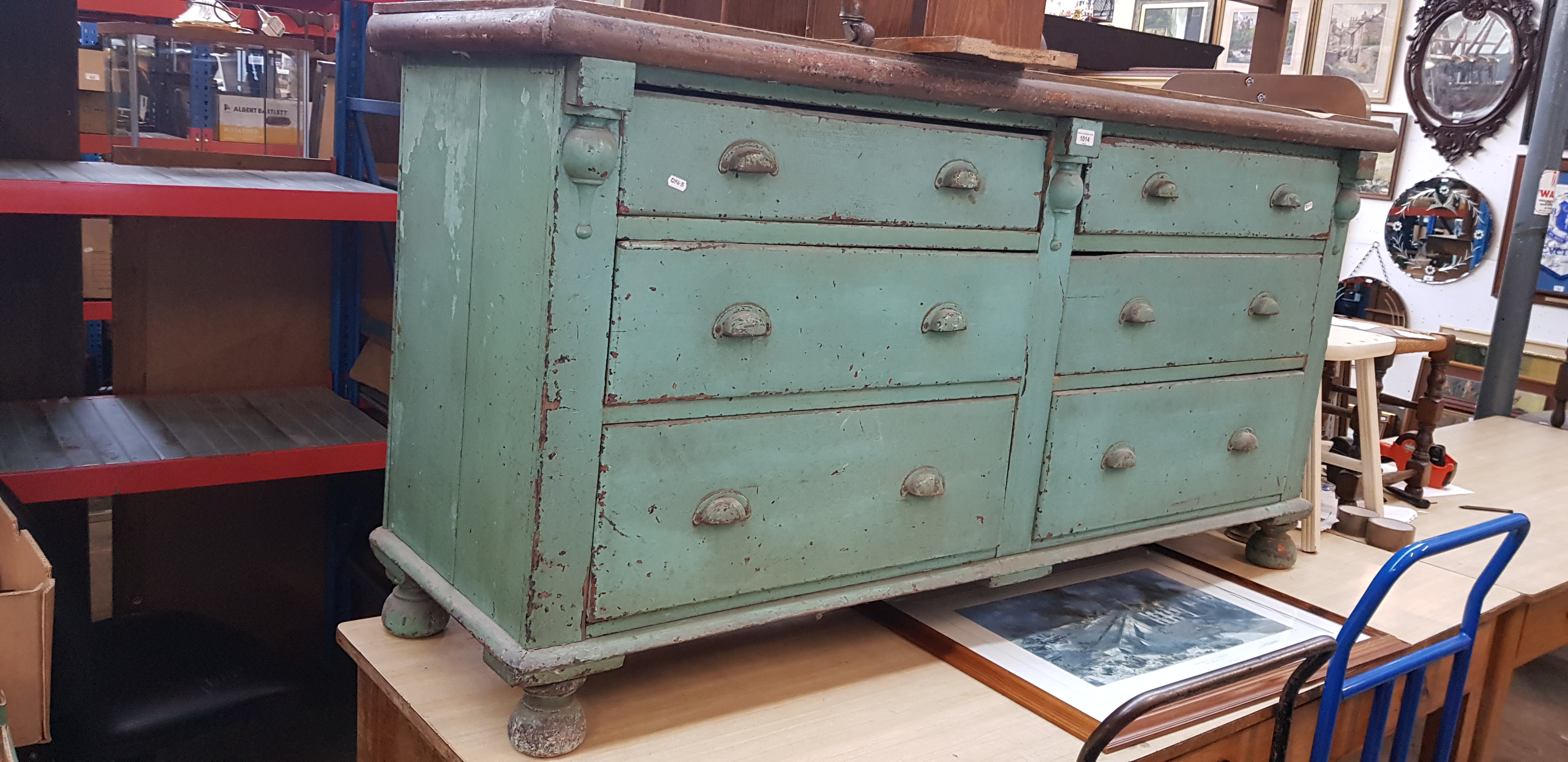 A green painted pine sideboard, circa 1900, height 87cm, length 166cm and depth 54cm.