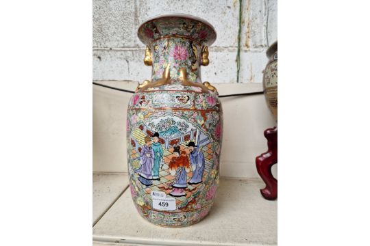 A Chinese Famille Rose vase, gilt decorated with flowers, butterflies and Chinese figures, height