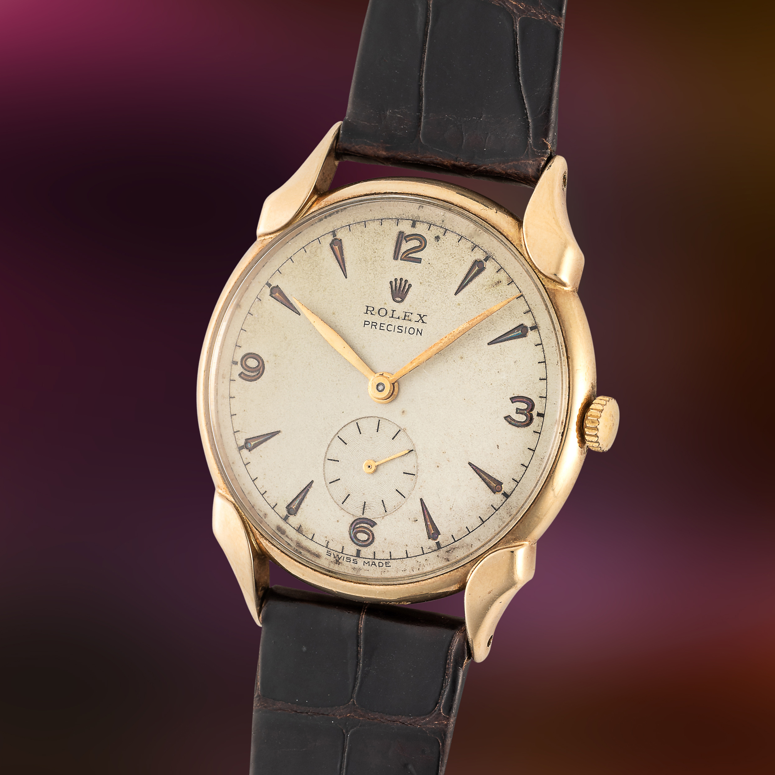 A RARE GENTLEMAN'S SIZE 9CT SOLID GOLD ROLEX PRECISION WRIST WATCH CIRCA 1950s, WITH SCALLOPED