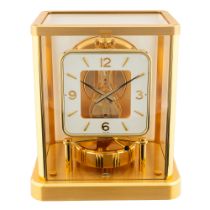 A GILT METAL CASED JAEGER LECOULTRE ATMOS DESK CLOCK CIRCA 1980s, RECENTLY SERVICED IN 2024 BY AN