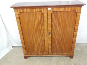 Edwardian inlaid mahogany cabinet the two doors opening to reveal three adjustable shelves, standing