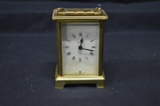 Bayard 8 day brass carriage clock with white paper dial (stained), Roman Numerals and black