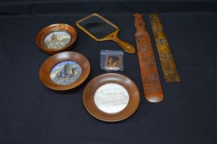 Group of three framed pot lids together with bamboo page turner and needle cushion etc Please note