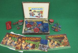 Old wooden box of playworn blue, red and gold coloured Meccano with instructions for Outfits 1, 3