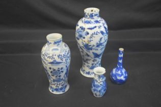 Four Oriental blue & white decorated vases, the taller two having four character backstamps -