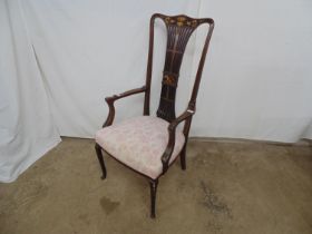 Inlaid mahogany high back elbow chair with pierced back splat having floral decoration, shaped